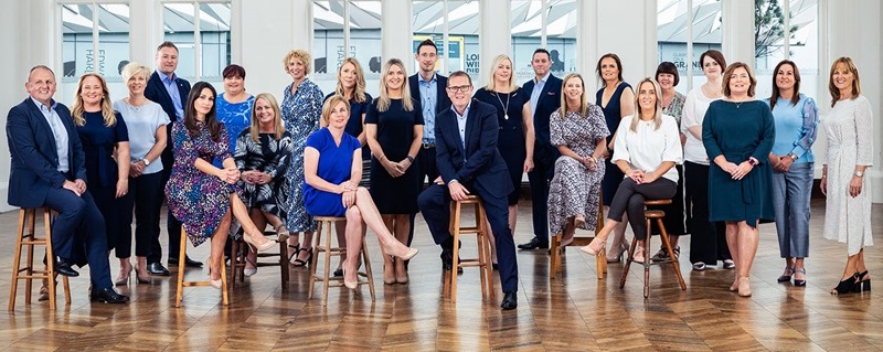 Photo of Palmciti Bank team celebrating.